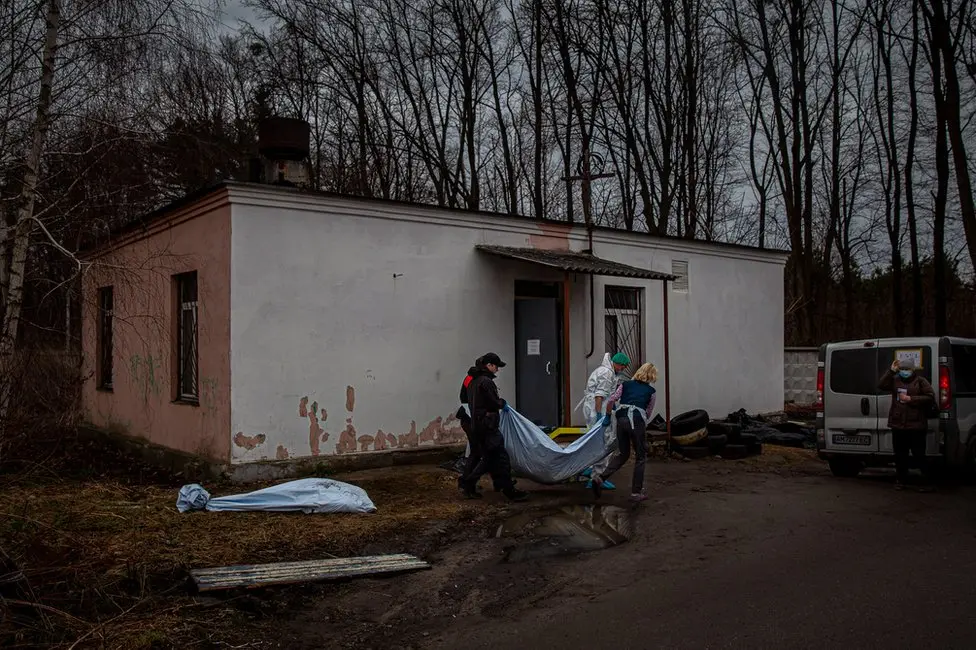 BBC The Boyarka morgue used to receive three bodies a day. Now it is autopsying about 50.