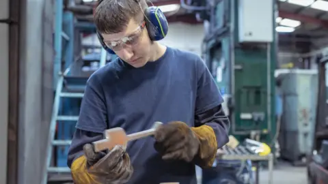 Getty Images An apprentice engineer