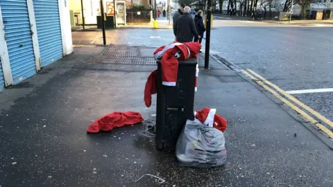 Zero Waste Scotland Santa costumes in bin