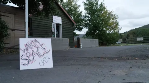 Community centre with sign showing it is a warm space