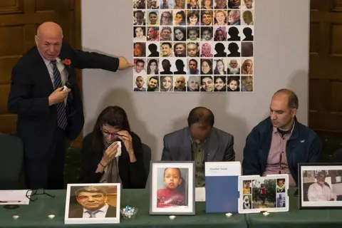 Getty Images Survivors and family members of people involved in the Grenfell fire (L-R) El Alami Hamdan, Flora Neda, Paulos Tekle, Hamid Al Jafari