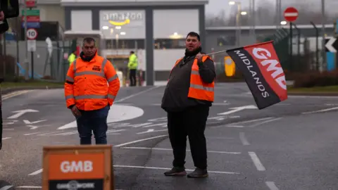 Reuters Workers on strike in Coventry