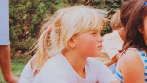 Supplied A vintage photo of a blonde girl on a school sports day