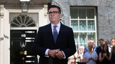EPA New British Prime Minister Andy Burnham delivers a speech outside 10 Downing Street in London, Britain, 20 July 2026.