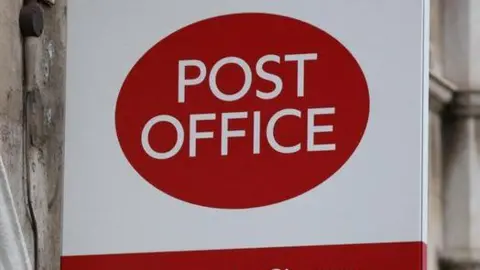 Close up of a Post Office sign