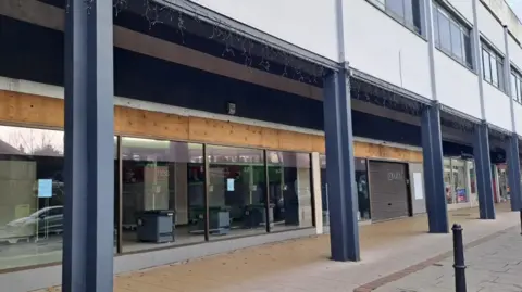 SteveJones/BBC An empty commercial unit  located at Headingley Central and is a former Wilko shop