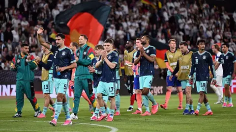Germany squad waving to the crowd