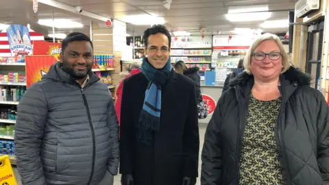 BBC / Naj Modak Jagadeesh Kandasami, North Yorkshire councillor George Jabbour and Caroline Frank, local resident and development manager for the Federation of Small Businesses in York and North Yorkshire