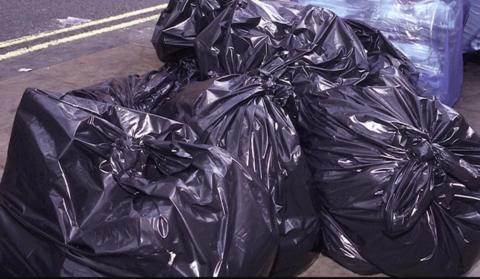 black bin bags waiting for collection