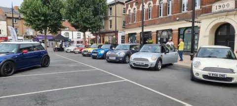 Gary Christy A line-up of Minis on March Market Square