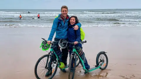 April Napala April Napala with Jason and their scooters