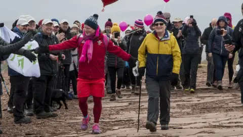 Paul Griffiths/Help for Heroes Des Lally approaches the summit with his dad