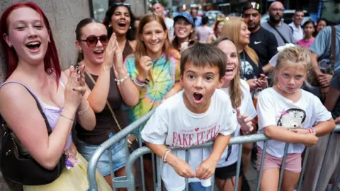 Taylor Swift fans gather outside of Madison Square Garden, the venue for the reported wedding celebrations of singer Taylor Swift and National Football League (NFL) player Travis Kelce, in New York, U.S., July 3, 2026.
