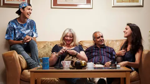 Channel 4 Andrew Michael with son Louis, wife Carolyne and daughter Alex