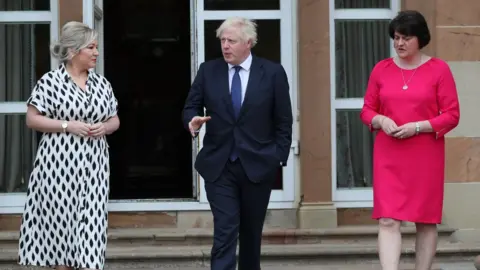 Brian Lawless/PA Boris Johnson is meeting Arlene Foster and Michelle O'Neill