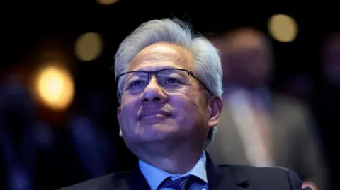 Nvidia boss Jensen Huang looks out during a forum in Washington DC in November