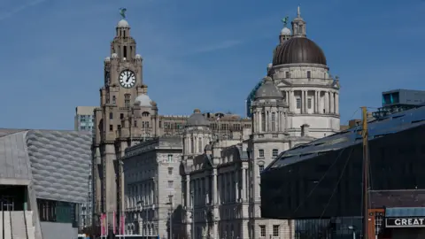 EPA The 'Three Graces, the Royal Liver Building (L), the Cunard Building (C) and the Port of Liverpool building (R) in Liverpool