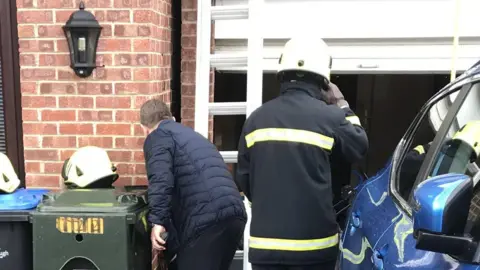 RSPCA Firefighters inspect the gap