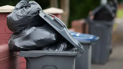 PA Stock image of bins in an alley