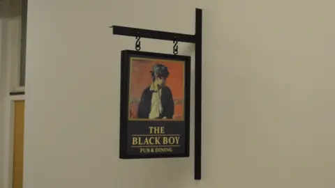 Daniel Trivedy The current sign at Killay's Black Boy