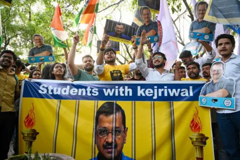Getty Images Students from CYSS, student wing of Aam Admi Party seen during a protest march against the arrest of Delhi CM Arvind Kejriwal at Arts Faculty, North Campus on April 16, 2024 in New Delhi, India.