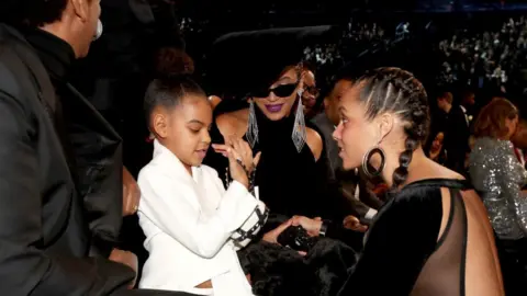 Getty Images Alicia Keys with Beyonce and Blue Ivy Carter