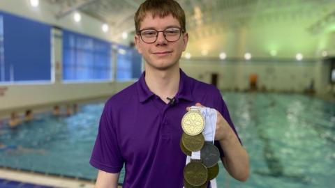 Nathan became a top schoolboy in disability swimming in Scotland