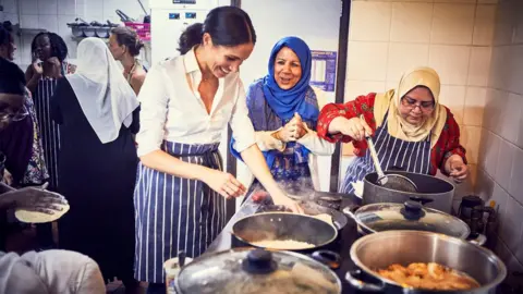 Reuters The Duchess of Sussex at the Hubb Community Kitchen