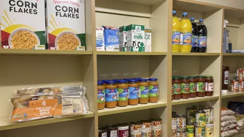 Shelves of food in the food hub