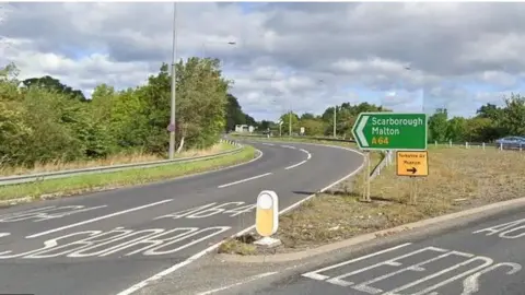 This is a shot of the eastbound junction - towards Scarborough - from York's Hopgrove roundabout. Unusually for this stretch - usually busy with traffic - only a couple of vehicles are in view.