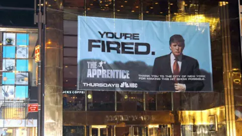Getty Images Donald Trump poster during Donald Trump's visit "The newbie" Sign thanking the City of New York at Trump Tower in New York City, New York, United States.
