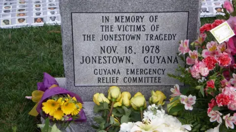 The Jonestown Institute Headstone commemorating the victims