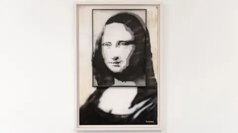 Mark Senior/The Art of Banksy/GTP Exhibitions Banksy's black and white version of the Mona Lisa