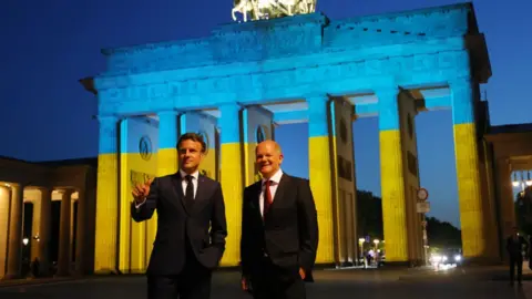 Getty Images Image shows Macron and Scholz