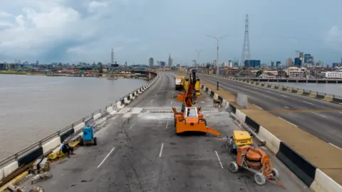 BBC/Ayo Bello Work being carried out on the Third Mainland Bridge in Lagos, Nigeria