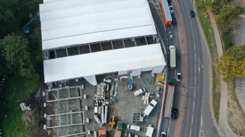 Highways England Aerial view of the tents being erected at Trinity Street burial ground