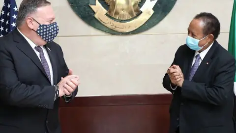 Getty Images US Secretary of State Mike Pompeo meets Sudan's Prime Minister Abdalla Hamdok in Khartoum, Sudan - 25 August 2020