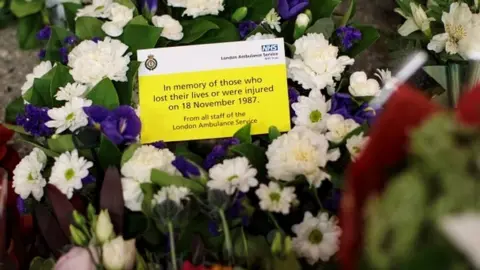 Getty Images Flowers laid at King's Cross
