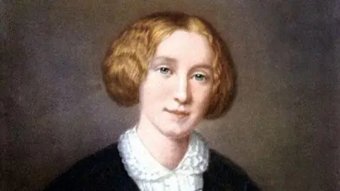 Getty Images A portrait of the author George Eliot, circa 1754. The picture shows her with her parted and tied up and a white blouse with a black shawl.