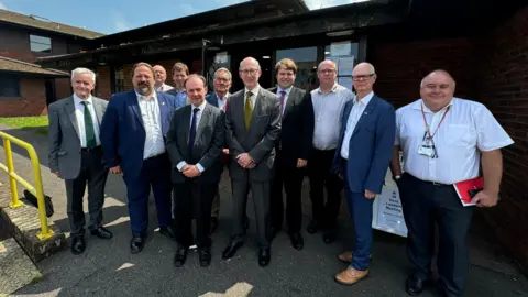 KENT COUNTY COUNCIL Kent council leaders outside a meeting in Dover