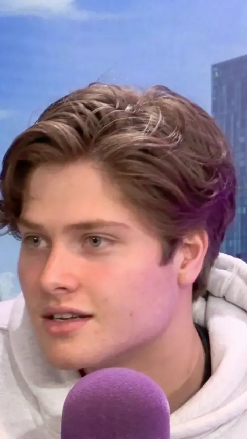 actor Lewis Walton in the BBC Radio Manchester studio