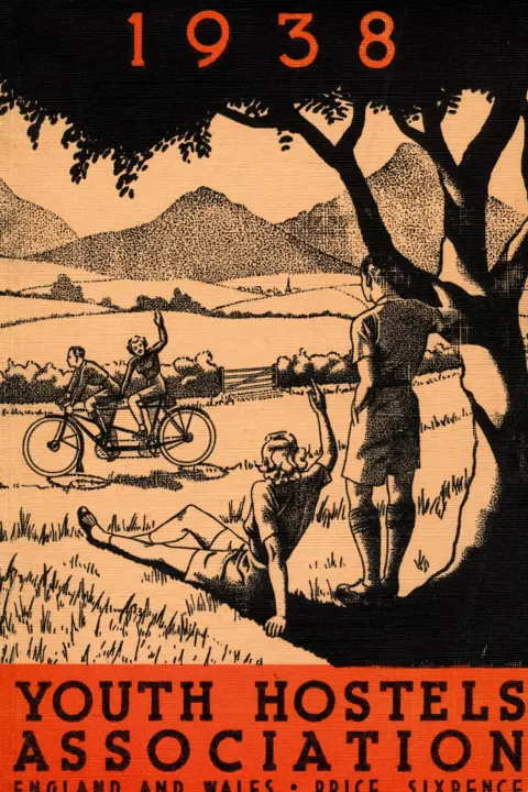Hostelling Scotland A cover for a Youth Hostels Association guidebook from 1938. The black and white illustration shows two people resting under a tree and waving to a man and woman riding by on a tandem bicycle. There are mountains in the background. The lettering on the cover is in red and black.