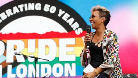 Getty Images Dame Kelly Holmes on stage during Pride in London 2022: The 50th Anniversary at Trafalgar Square on 02 July 2022 in London, England. (Photo by Tristan Fewings/Getty Images for Pride In London)
