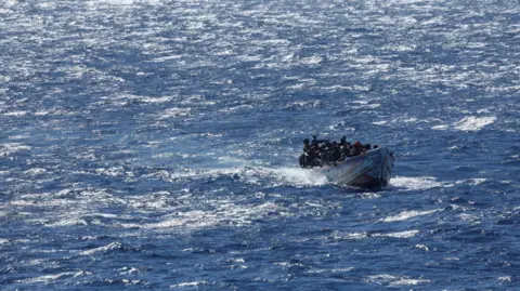 Migrants in a wooden boat near the Canary Islands of El Hierro. Photo: November 2023