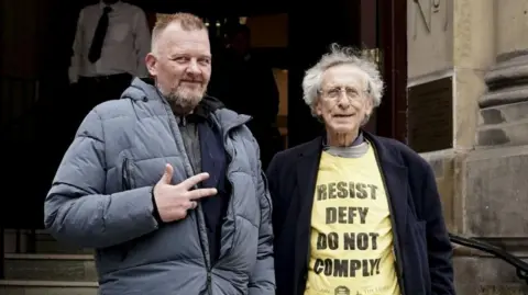 PA Simon Parry and Piers Corbyn