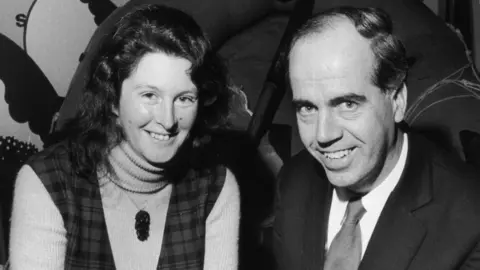 Getty Images A black and white head and shoulder shot of Maralyn and Maurice 