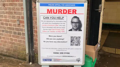 An appeal poster outside East Finchley Underground station in north London as Metropolitan Police detectives are appealing for information in the unsolved murder of Anthony Littler, which took place just outside of the station in May 1984. Picture date: Tuesday December 5, 2023.