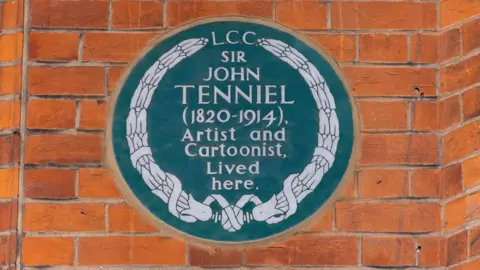 English Heritage A green plaque which says "LCC, Sir John Tenniel, 1820-1914, Artist and cartoonist lived here