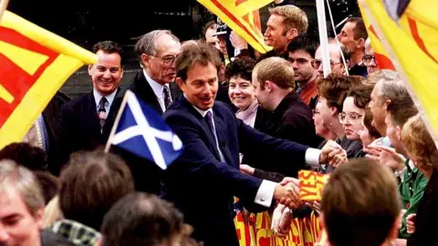 PA Tony Blair in Scotland the day after the vote for devolution in September 1997