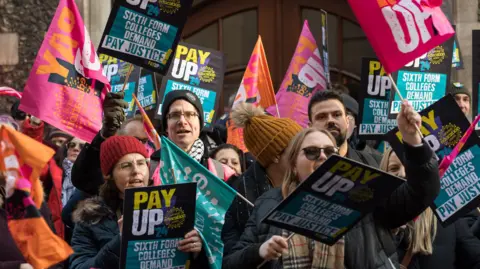 Sixth form college teachers take part in a rally outside Department for Education